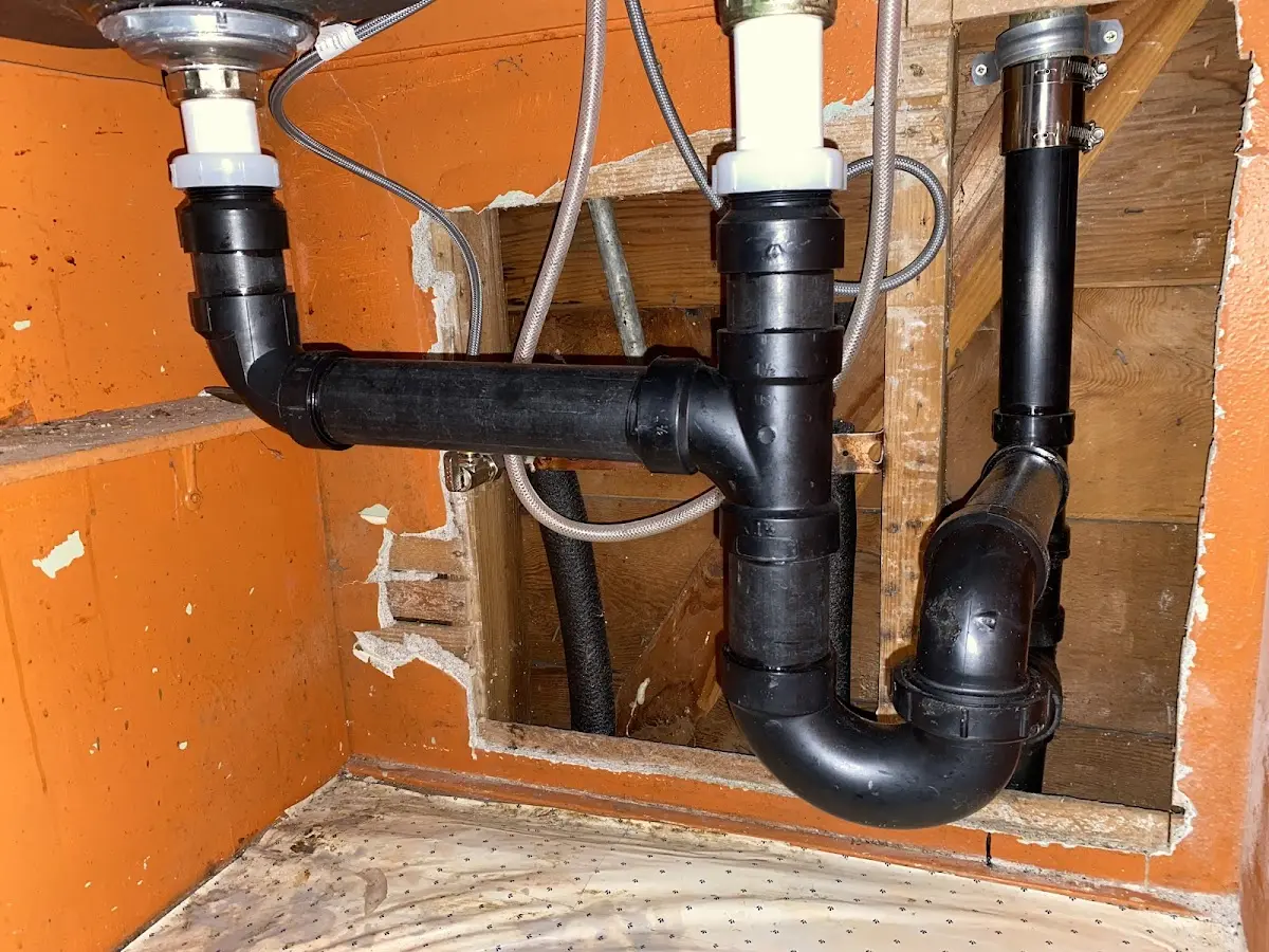 Professional Garbage Disposal Repair equipment and tools on the job in Hoboken
